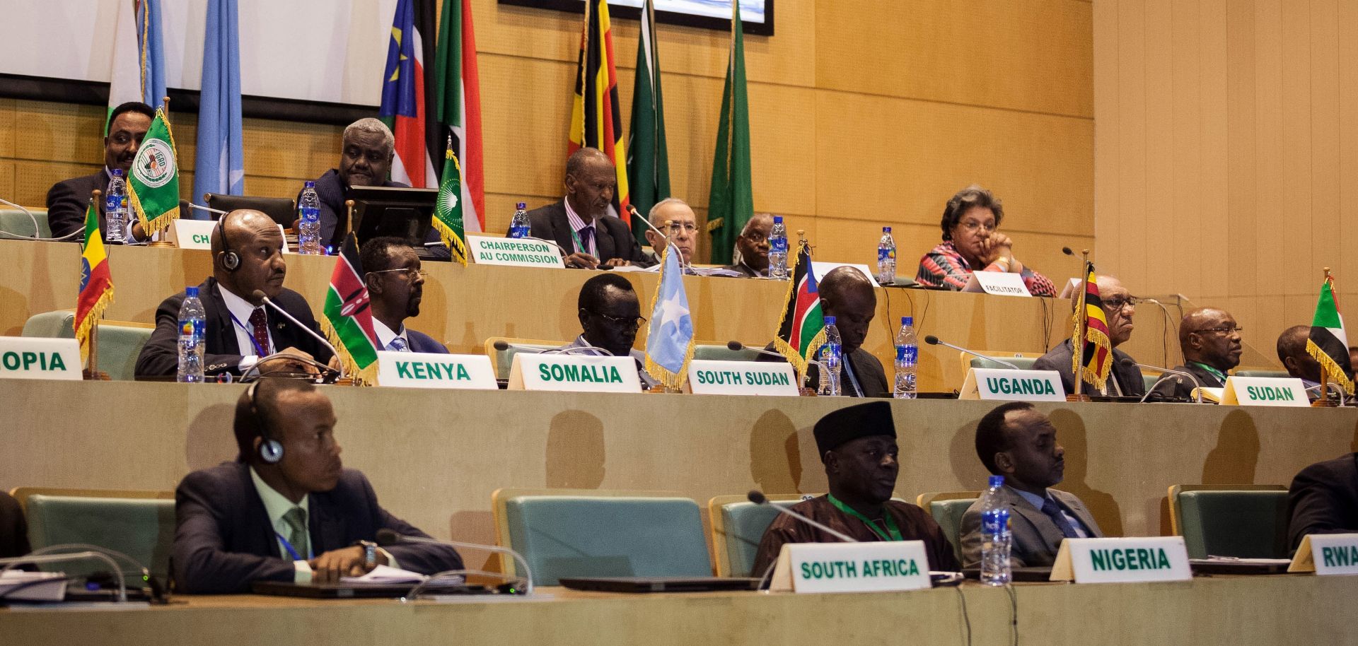 Representatives from the Intergovernmental Authority for Development, including Moussa Faki, chairperson of the African Union (top row, second from left), gather in Ethiopia Dec. 21, 2017, as members of South Sudan's government and insurgent groups sign a cease-fire.  