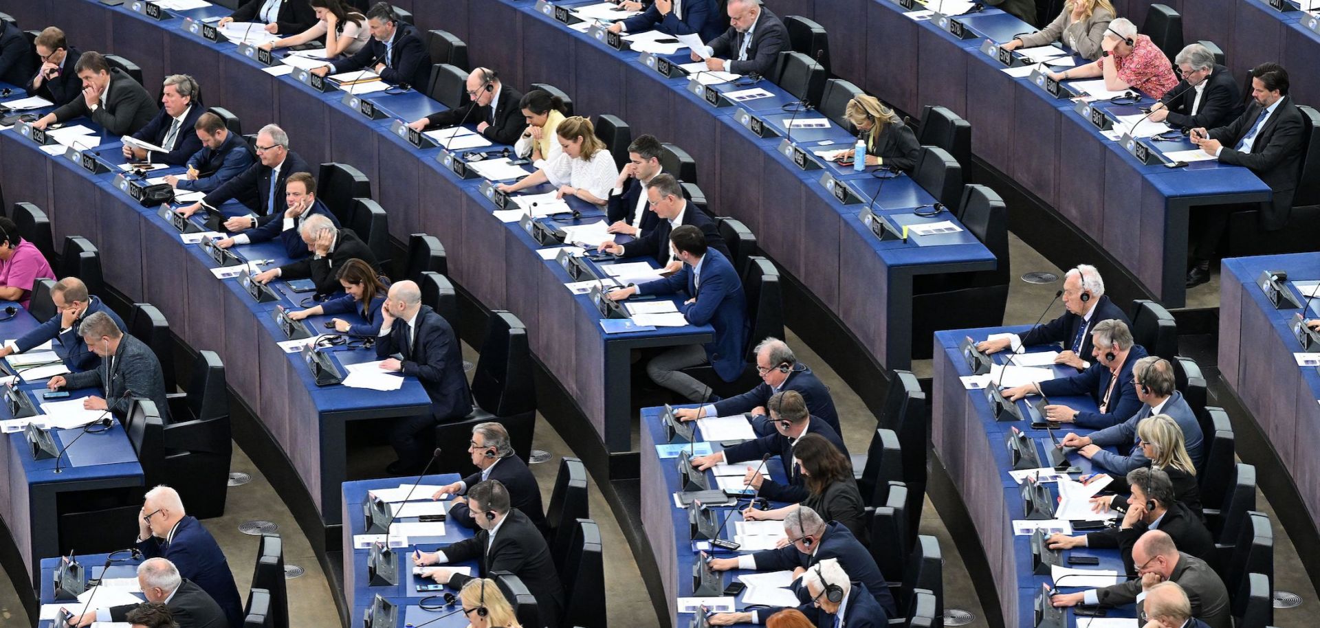Members of the European Parliament take part in voting on the Artificial Intelligence Act during a plenary session at the European Parliament.