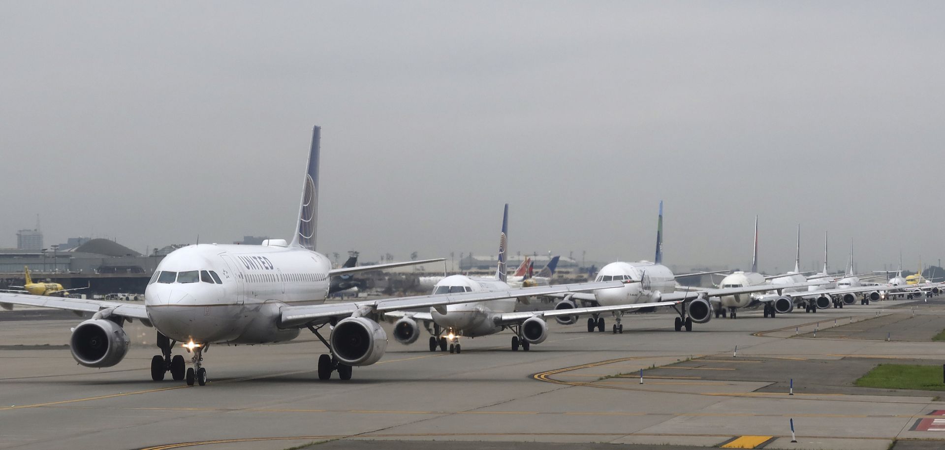 Airplanes await permission to take off at on July 13, 2021, at Newark Liberty International Airport. 