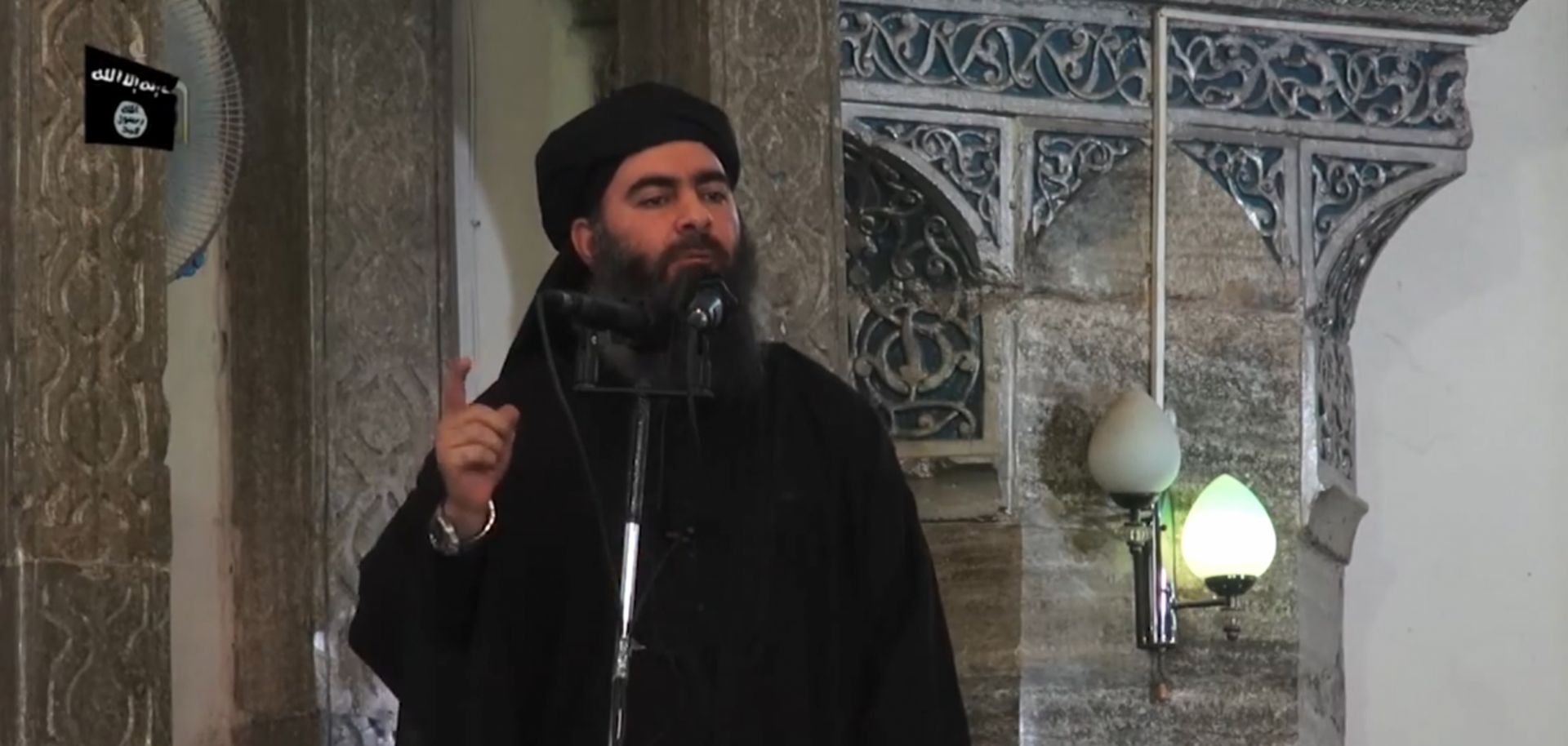 An image grab from a 2014 propaganda video released by al-Furqan media allegedly showing Islamic State Abu Bakr al-Baghdadi addressing worshippers at a mosque in the Iraqi city of Mosul.