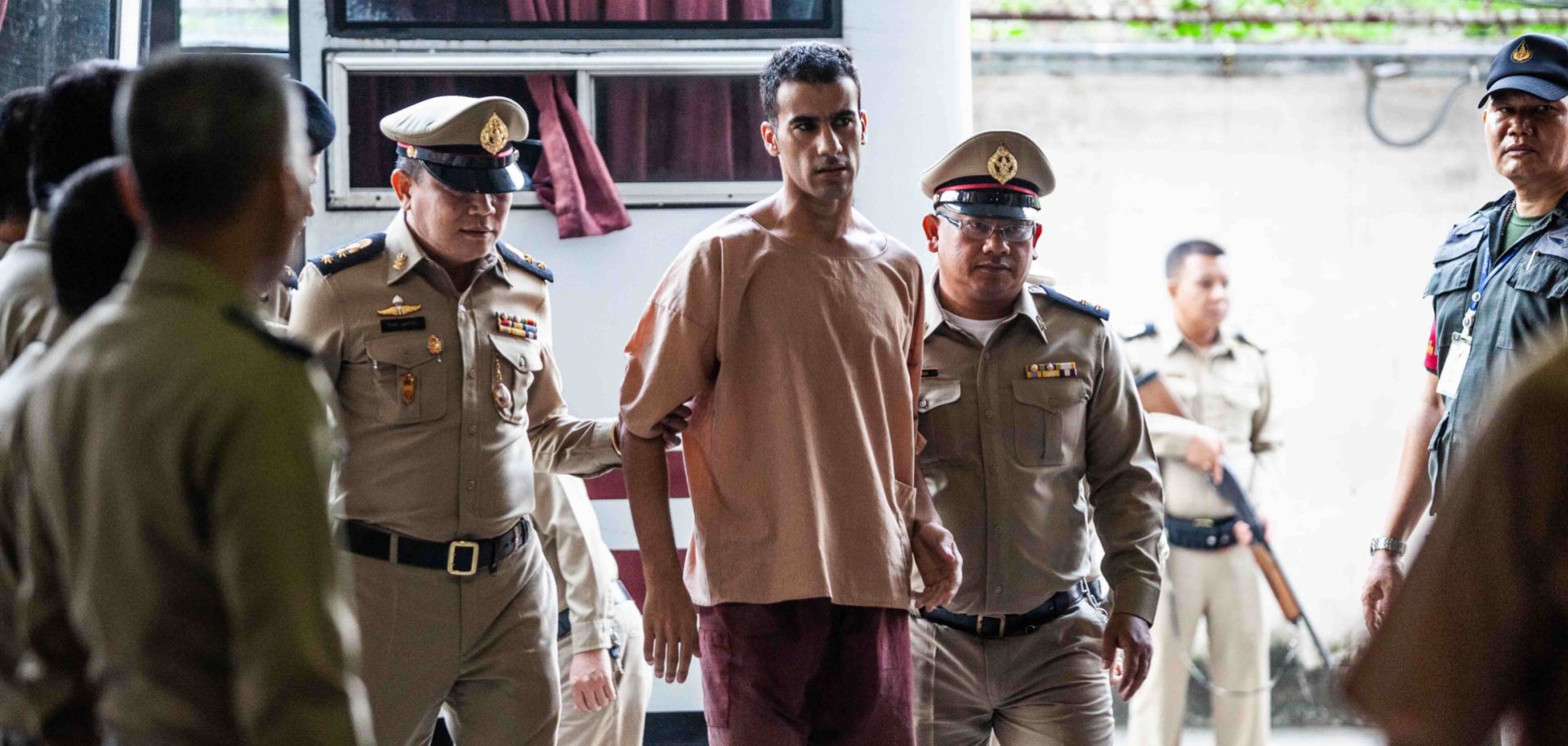 Soccer player Hakeem al-Araibi, who is facing extradition from Thailand to Bahrain, arrives for a court hearing in Bangkok on Feb. 4, 2019.