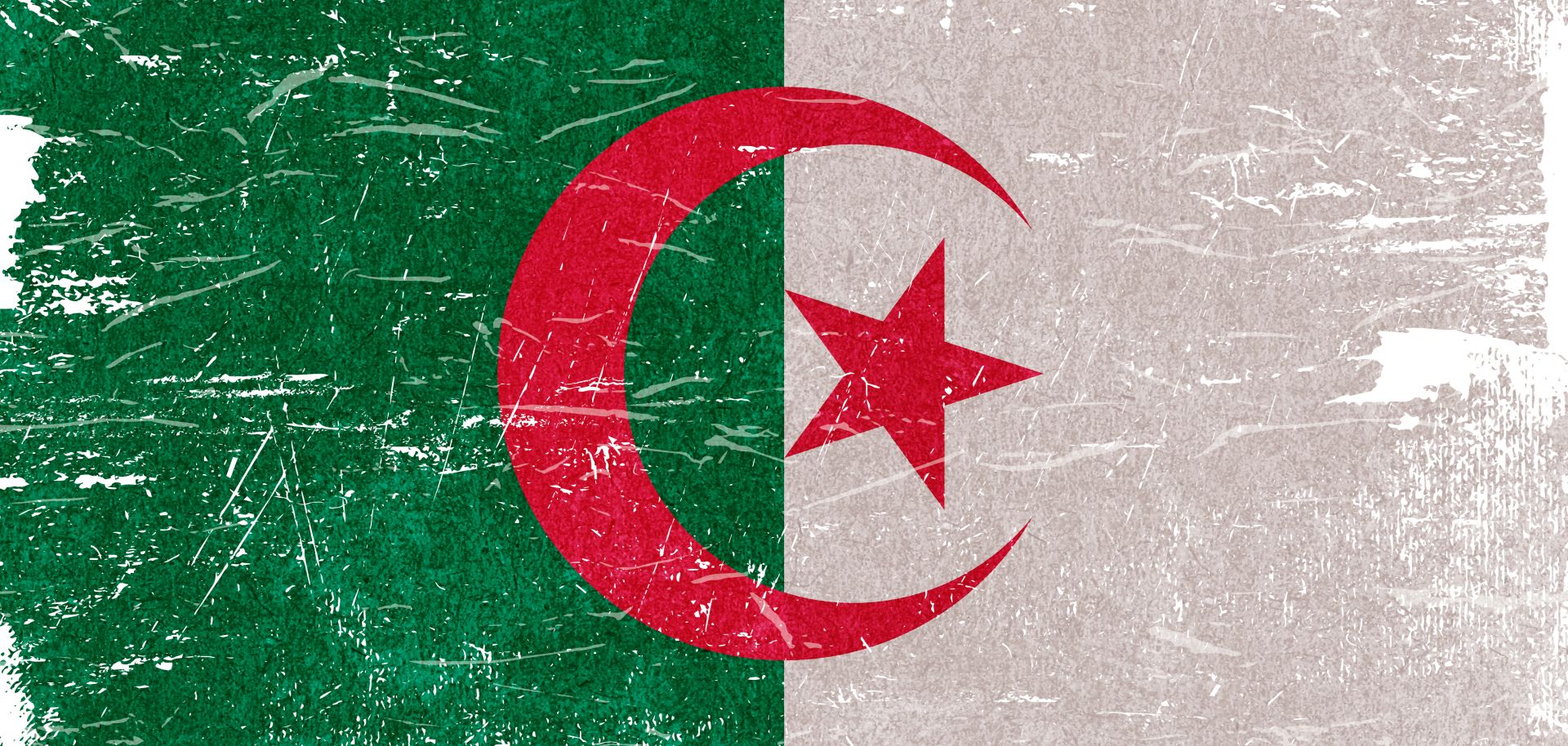 An image of the Algerian flag. Plummeting oil demand and prices due to the COVID-19 crisis have sapped the Algerian government of its primary revenue source.