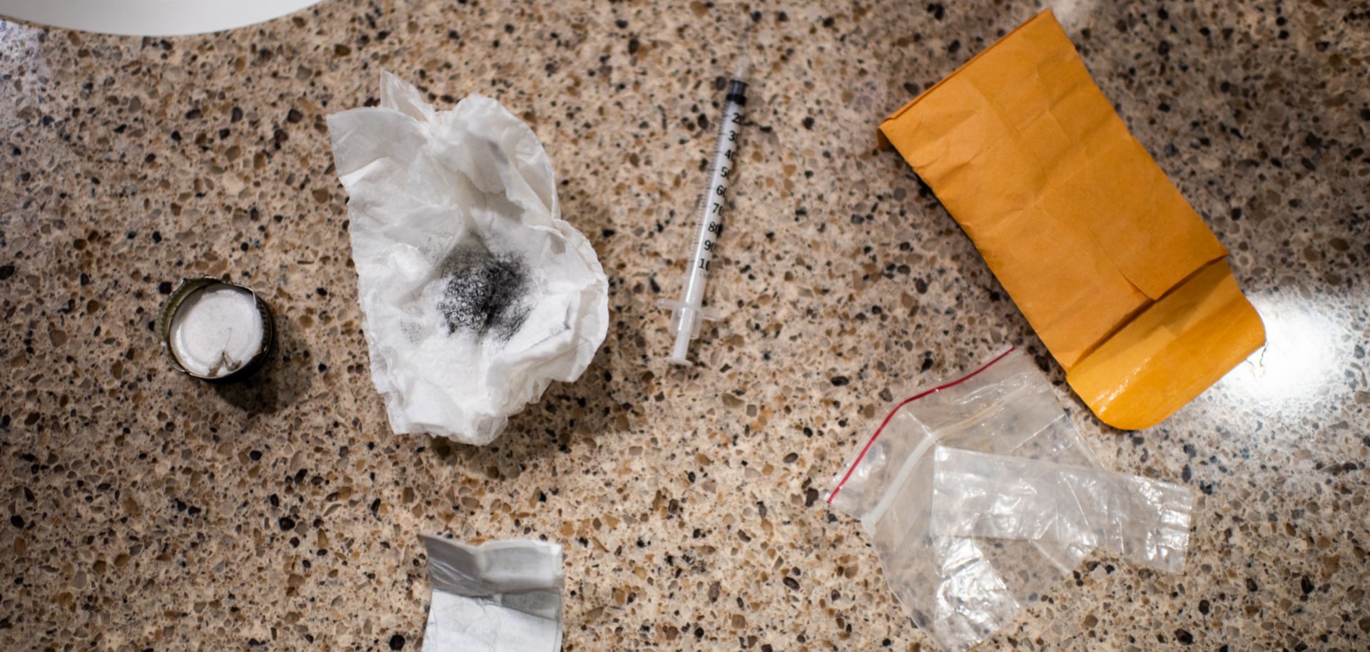 A kit is seen next to the sink of a Walmart bathroom in Manchester, New Hampshire, on Feb. 10, 2019, after a woman was caught trying to shoot either heroin or fentanyl.
