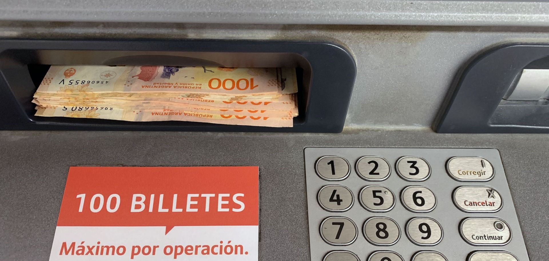 A view of Argentine pesos during a withdrawal from an ATM in Buenos Aires on July 2, 2022, before Argentina's former Economy Minister Martin Guzman announced his resignation.