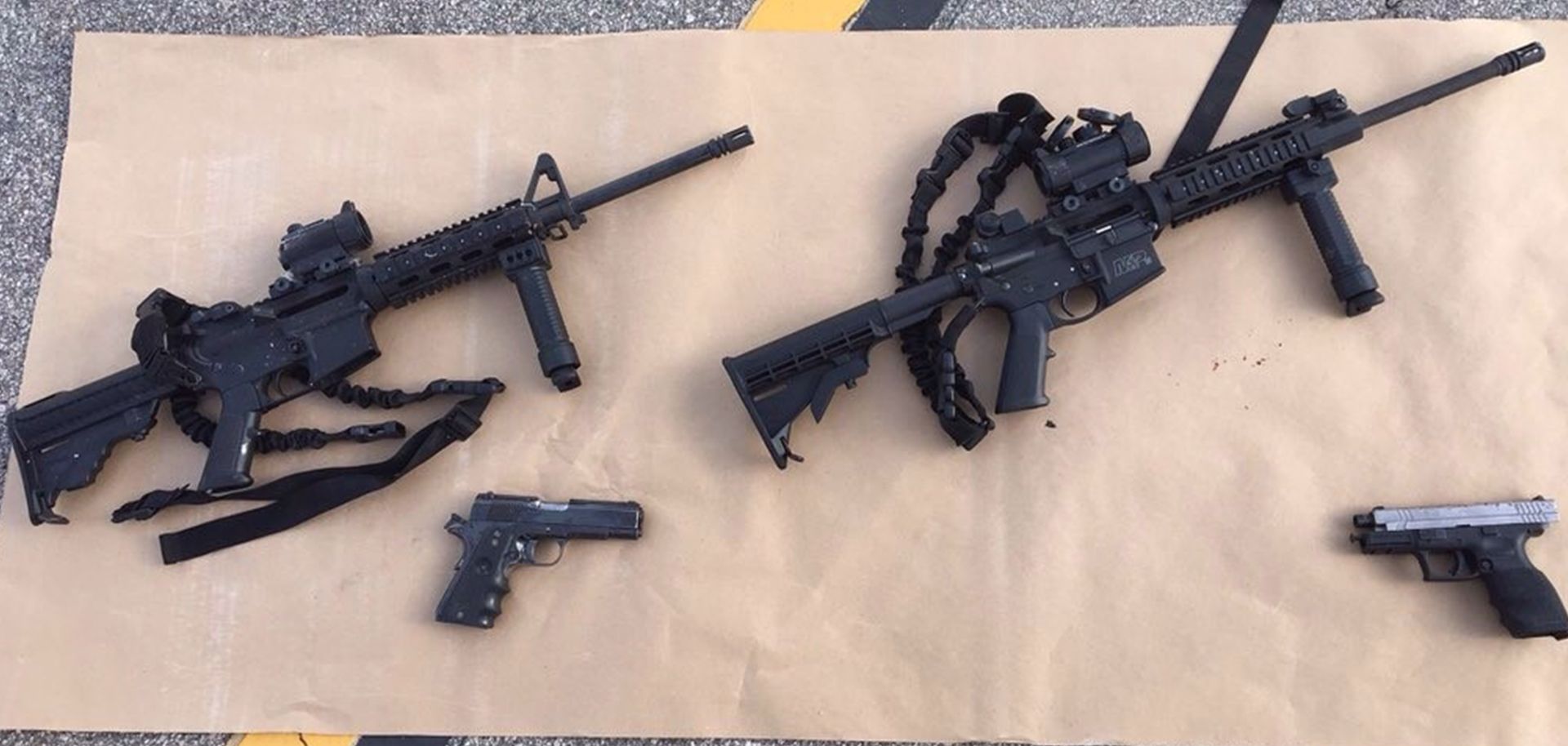 Four guns near the site of a shootout between police and suspects in the San Bernardino shootings, Dec. 4, 2015.