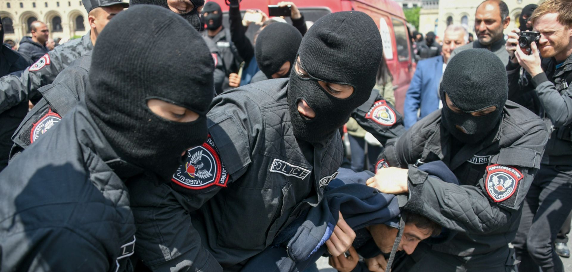 In this photograph, Armenian police arrest a man during a protest in Yerevan, the country's capital, on April 22, 2018. 