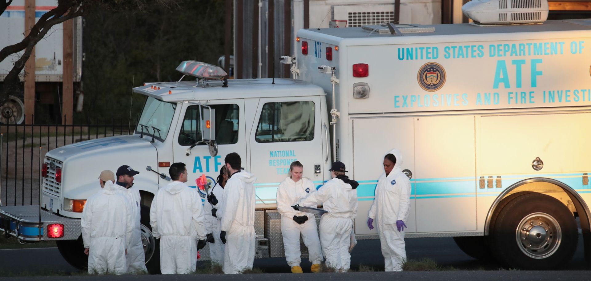 A picture shows evidence technicians in Round Rock, Texas, searching for evidence at the site where serial bomber Mark Anthony Conditt ended his life with a self-inflicted bomb blast.