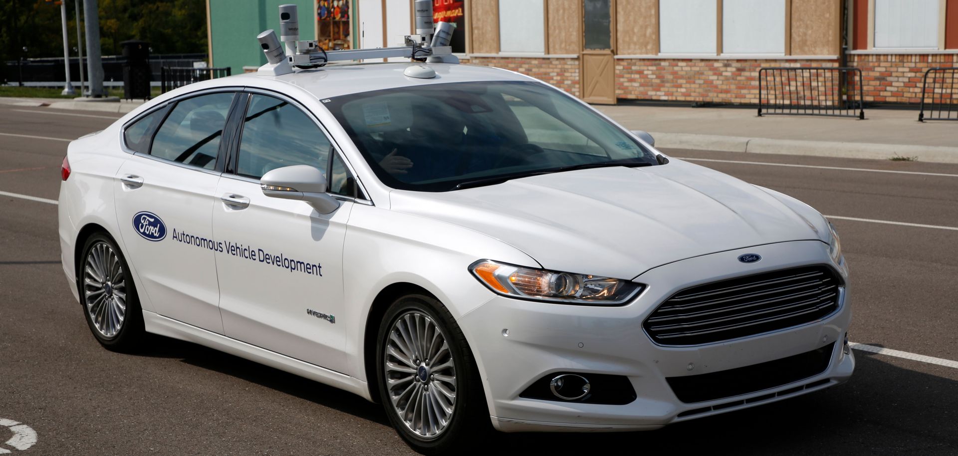 A fully autonomous Ford Fusion wends its way through a test course in Ann Arbor, Michigan.