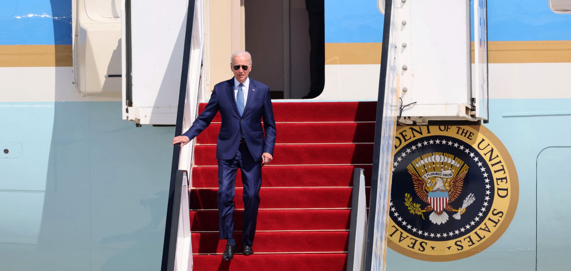 U.S. President Joe Biden disembarks from his plane upon landing at Ben Gurion Airport near Tel Aviv, Israel, on July 13, 2022, as he starts the first leg of his Middle East tour. 