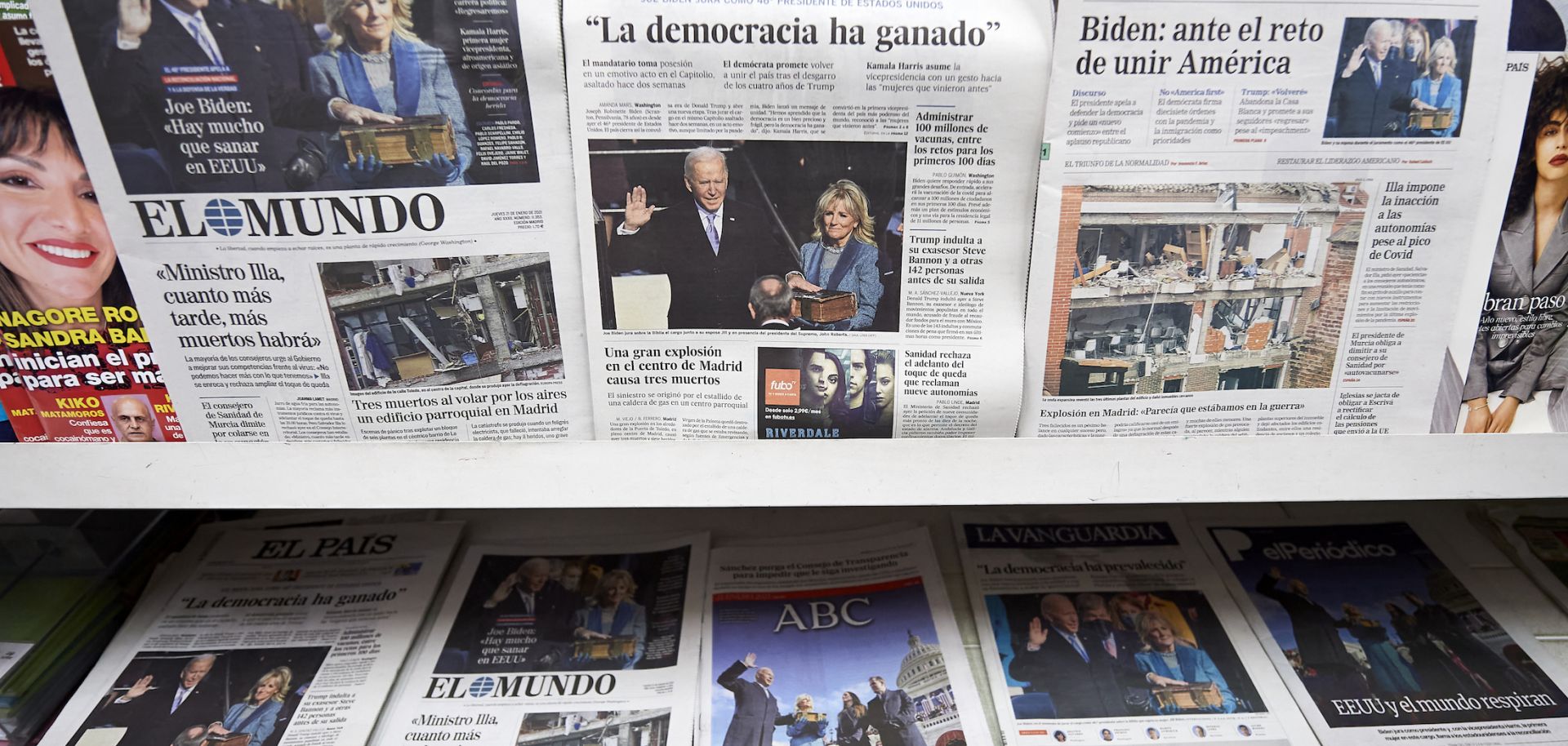 Spanish newspapers show images of newly sworn-in U.S. President Joe Biden on Jan. 21, 2021, in Madrid, Spain.
