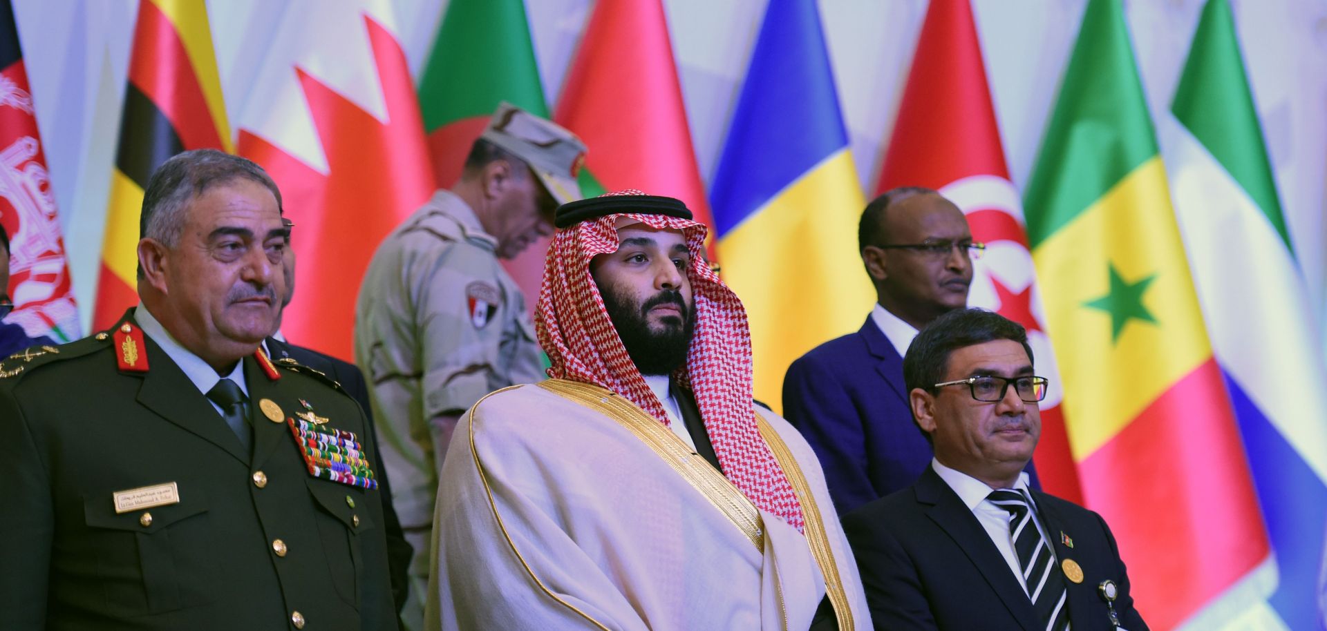 Saudi Defense Minister and Crown Prince Mohammed bin Salman, center, stands for a photo-op with his counterparts from other countries in Saudi Arabia's Islamic Military Counterterrorism Coalition at a meeting in Riyadh.