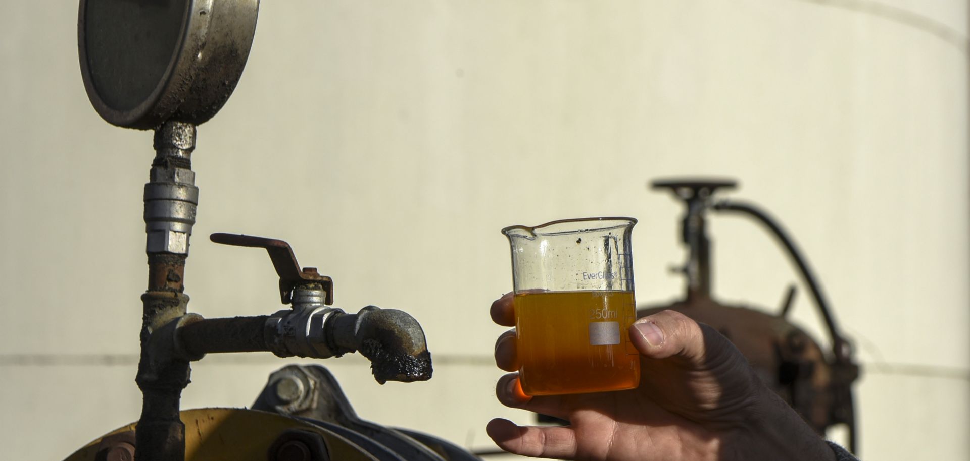 An engineer shows a sample of biodiesel at an industrial complex in General Lagos, Argentina on Sept. 13, 2017.