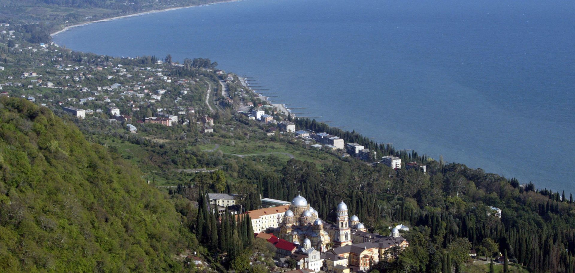 A photograph shows Abkhazia's Black Sea coast. 