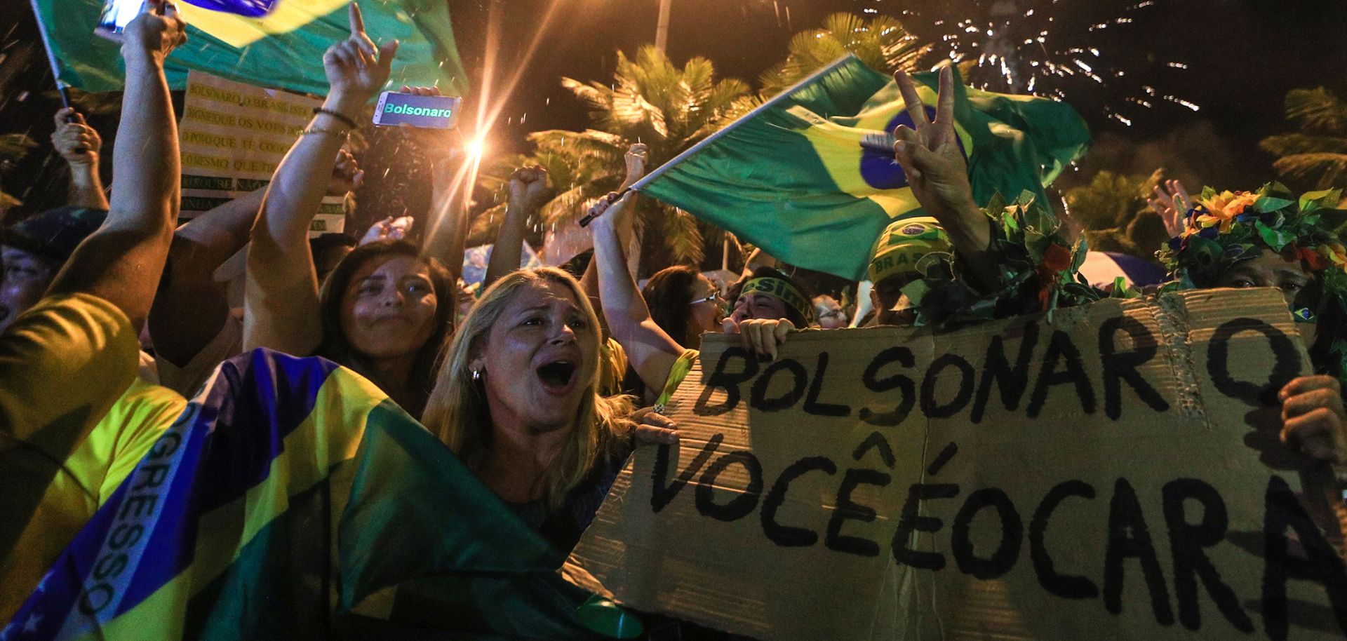 Brazilian supporters of populist candidate Jair Bolsonaro celebrate his presidential victory on Oct. 28.