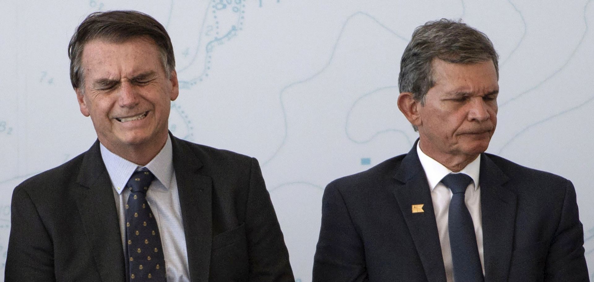 Brazilian President-elect Jair Bolsonaro (L) and Defense Minister General Joaquim Silva e Luna attend the launch ceremony of the Brazilian Riachuelo Class Submarine at a navy base in Itaguai city, Rio de Janeiro state, on Dec. 14, 2018.