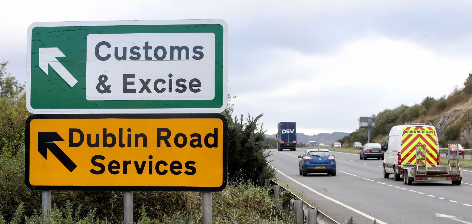 Signs point to an old customs and excise area in Newry, Northern Ireland, on Oct. 1, 2019 on the border between Newry in Northern Ireland and Dundalk in the Irish Republic.