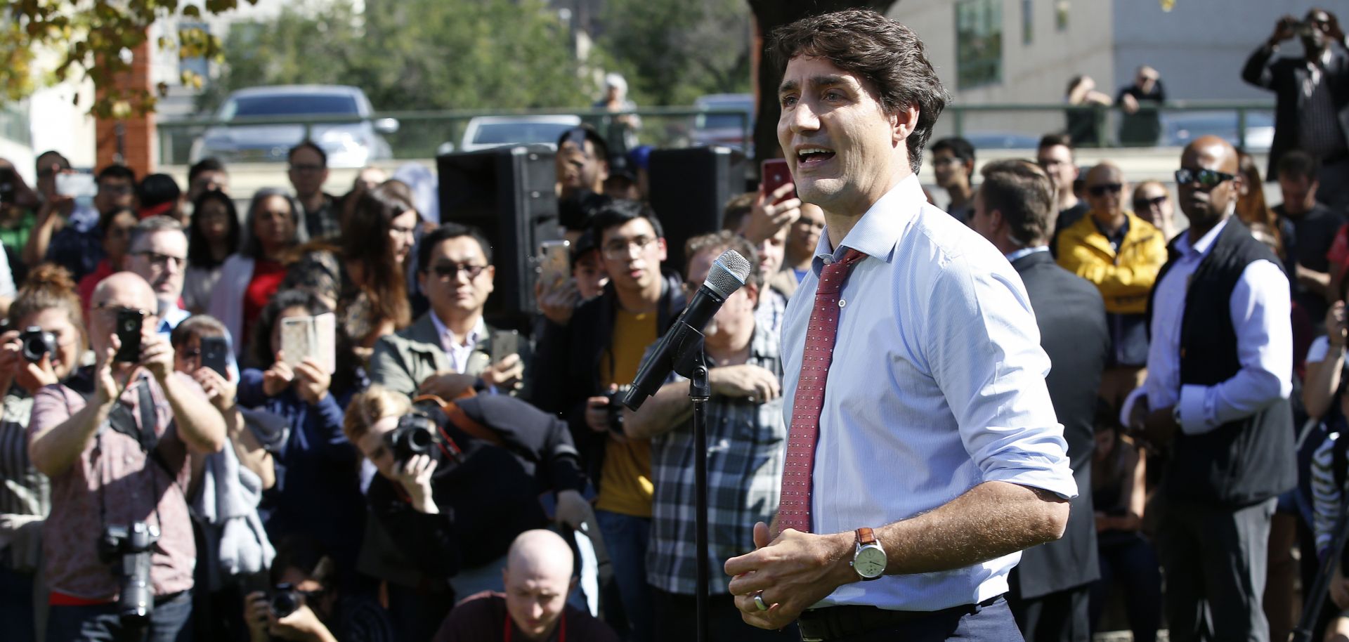 Canadian Prime Minister Justin Trudeau addresses the media in Winnipeg, Manitoba, on Sept. 19, 2019, regarding photos and video that have surfaced in which he is wearing dark makeup.