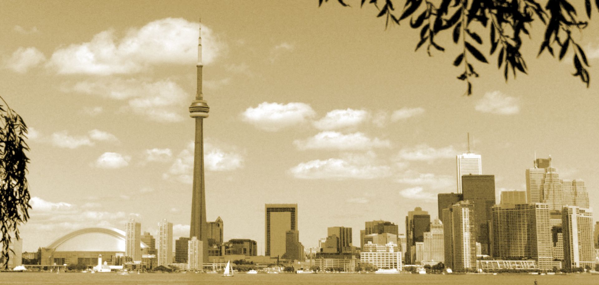 The iconic CN Tower anchors Toronto's skyline on a clear day.