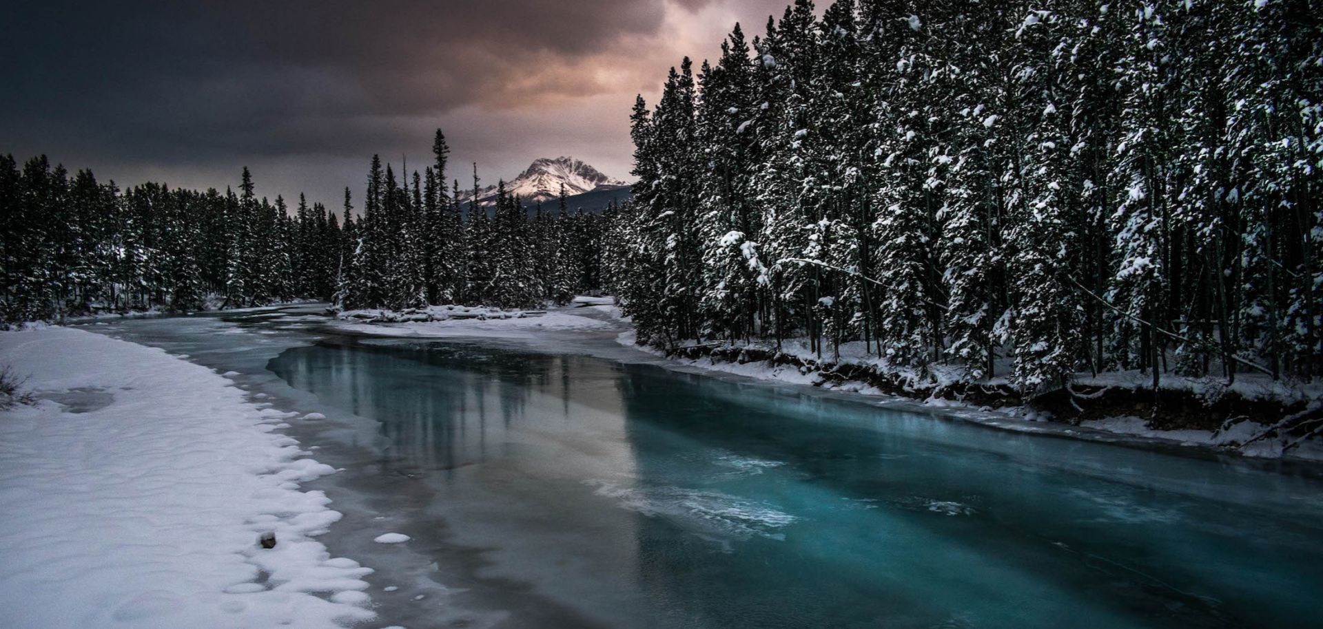 The Bow River in Alberta is partially frozen