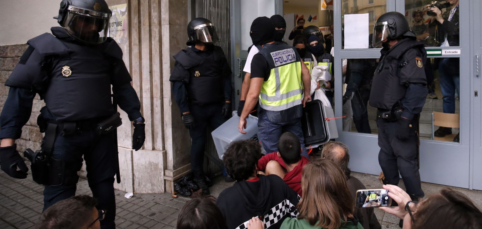 Spanish police seize ballot boxes in a polling station in Barcelona, on Oct. 1, 2017, on the day of a referendum on independence for Catalonia banned by Madrid. And after hundreds were injured in clashes on election day and voting was disrupted so thoroughly that results cannot be considered reliable, it's clear that things in the region will get worse before they get better.