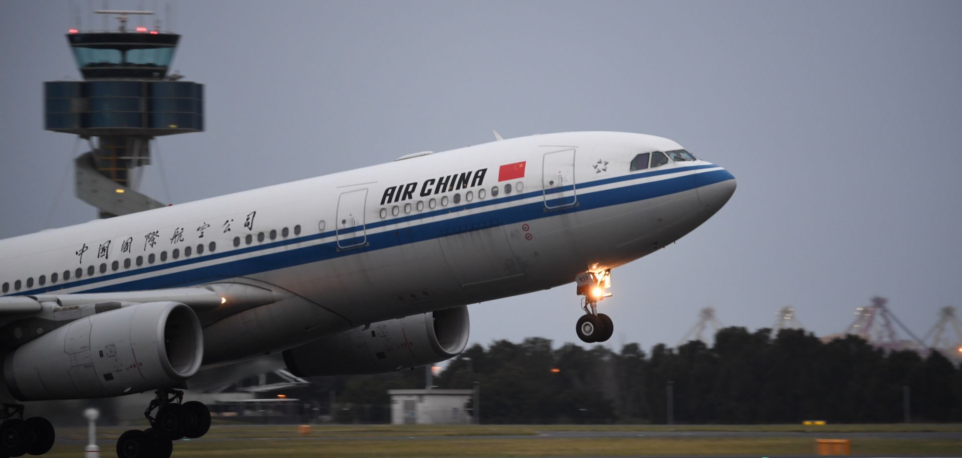 An Air China aircraft takes off at Sydney Kingsford Smith International Airport in Sydney, Australia.
