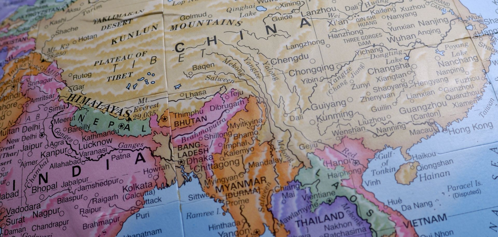 In this photo, a map shows the positions of China and India on the globe.