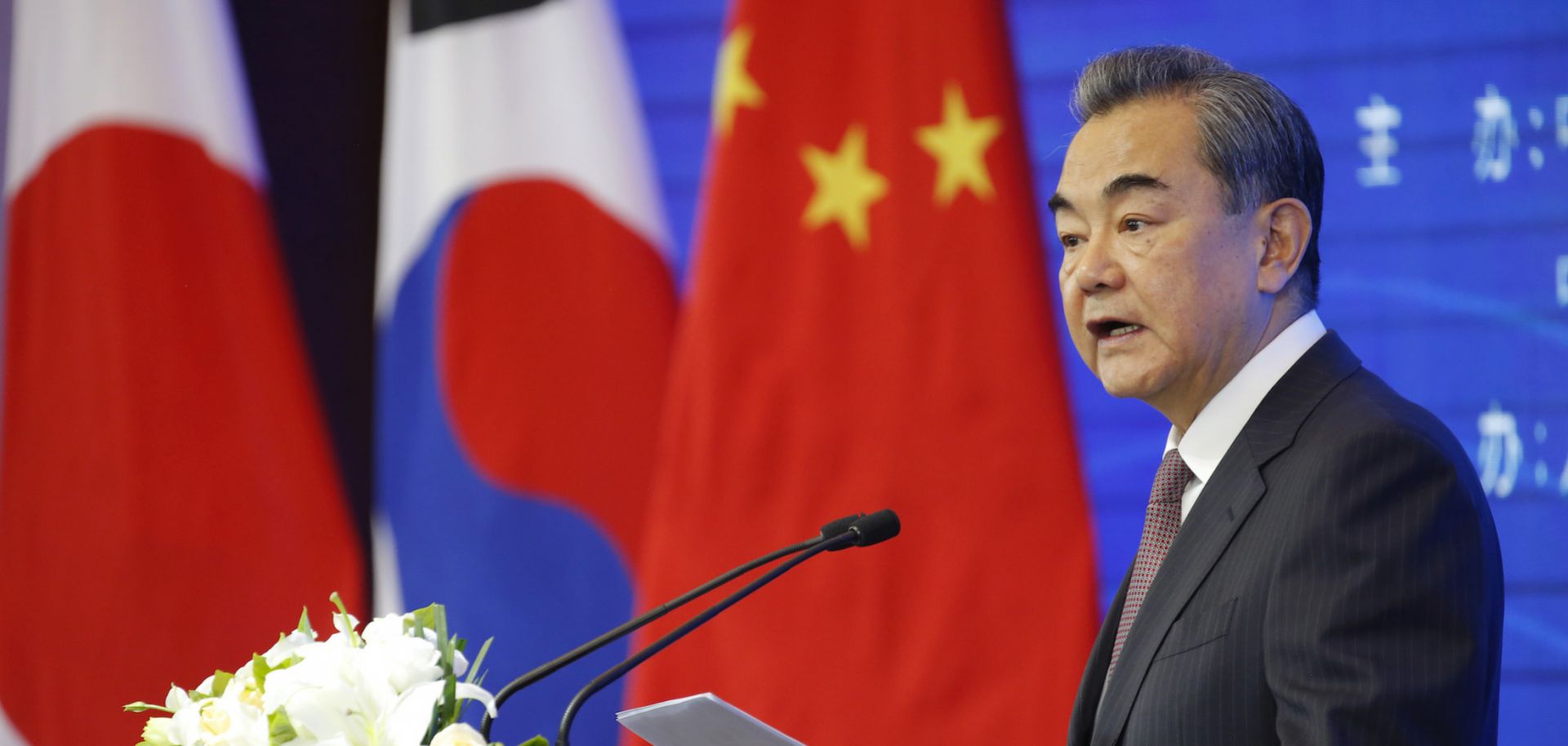 Chinese Foreign Minister Wang Yi speaks at the opening ceremony of the International Forum for Trilateral Cooperation that commemorated the 20th anniversary of trilateral cooperation among China, South Korea and Japan, in Beijing, China, on May 10, 2019. 