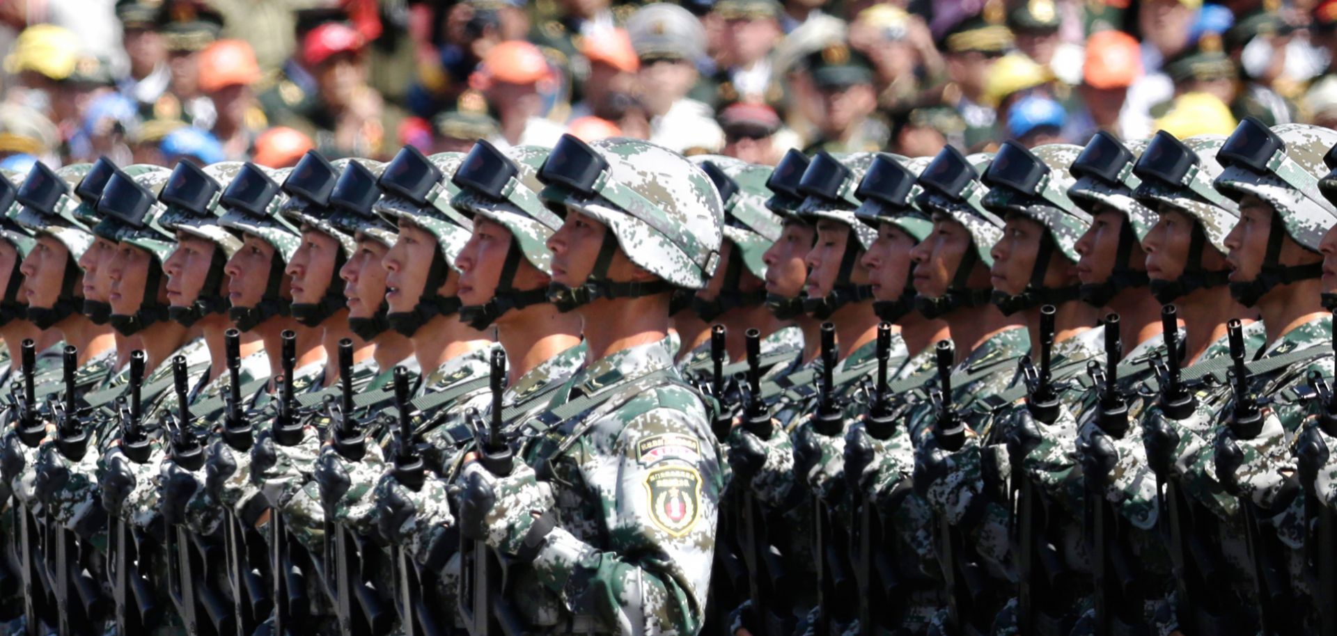 Service members from each branch of the military prepare to march