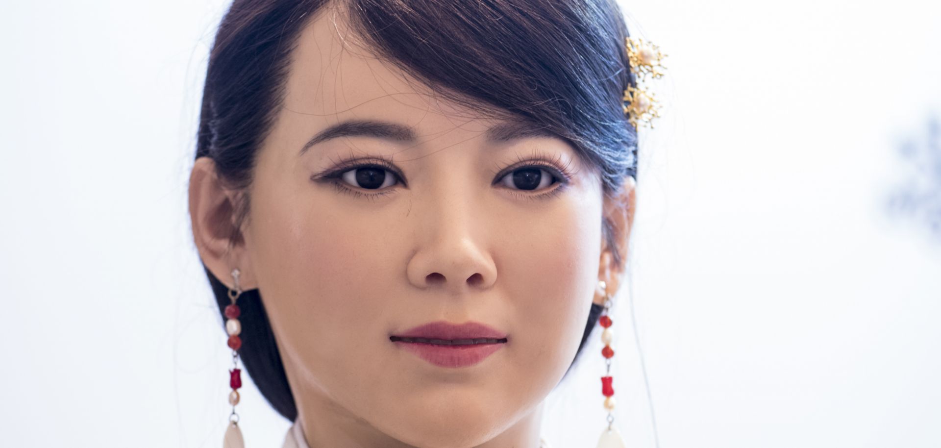 Jia Jia, a lifelike robot created by Chinese engineers, demonstrates at least one of her facial expressions at a conference in Shanghai on Jan. 9, 2017.