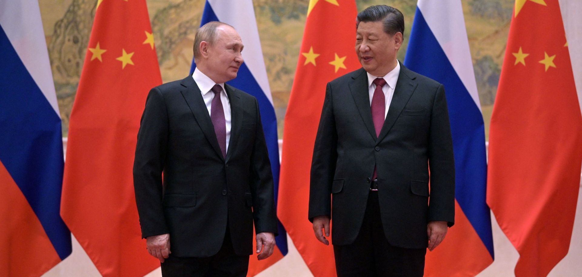 Russian President Vladimir Putin (L) and Chinese President Xi Jinping pose during their Feb. 4, 2022, meeting in Beijing.