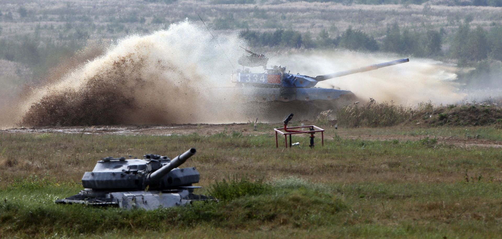 A Chinese battle tank competes in a tank biathlon event held by the Russian military on Aug. 27, 2022, outside of Moscow, Russia. 