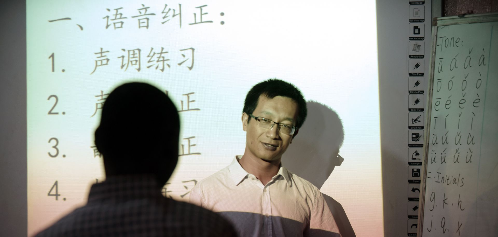 An instructor gives a lesson in Chinese language at a Confucius Institute in Lagos, Nigeria, in April 2016.
