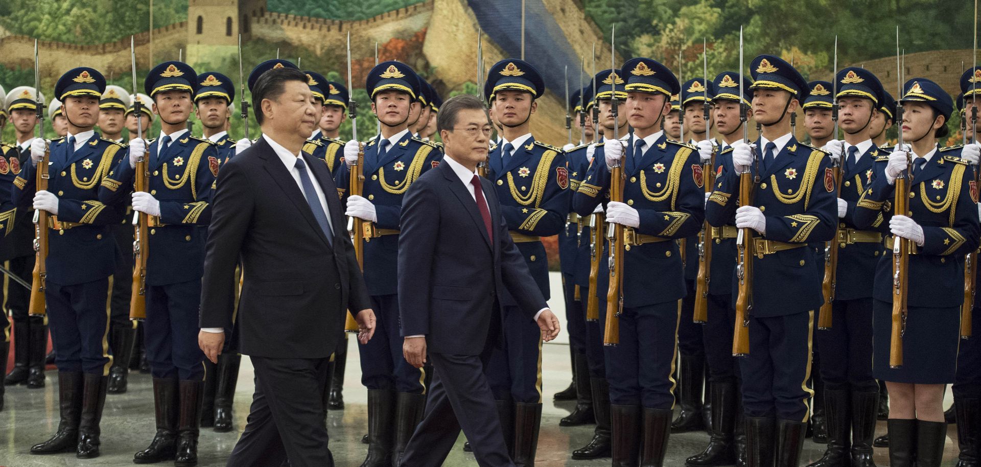 South Korean President Moon Jae In (R) and Chinese President Xi Jinping (L) during a welcome ceremony in Beijing, China, on Dec. 14, 2017. Despite attempts to heal old wounds and build a more supportive partnership during Moon's visit to China, Seoul and Beijing find themselves with increasingly divergent priorities.