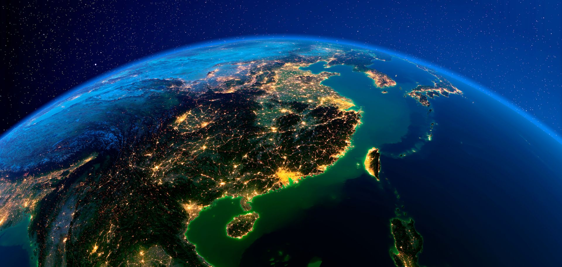 A 3D rendering of eastern China and the island of Taiwan lit by city lights from space. 