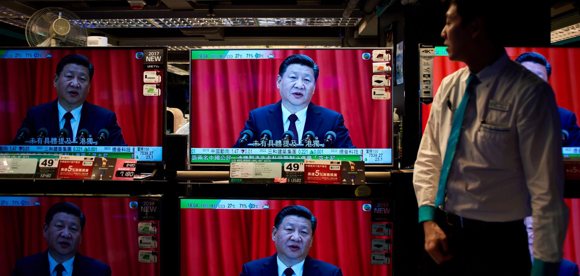 Televisions on display at an electronics store in Hong Kong are all tuned to Chinese President Xi Jinping's address to the 19th Chinese Communist Party Congress on Oct. 18, 2017.