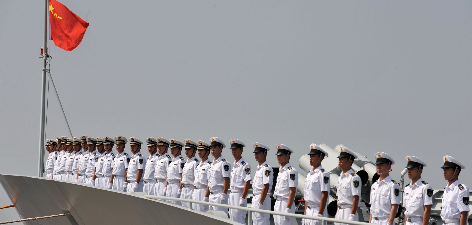 Members of the Chinese Navy stand at attention.