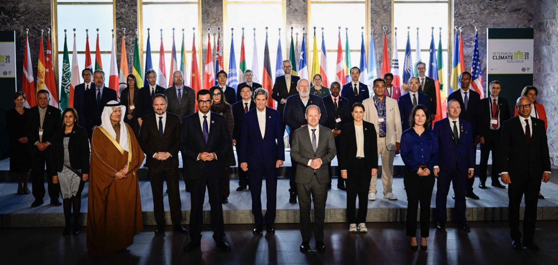 COP28 President-Designate and the UAE's Special Envoy for Climate Change, Sultan al-Jaber (front row, fourth from left) -- poses for a group photo along with U.S. Climate Envoy John Kerry, German Chancellor Olaf Scholz, German Foreign Minister Annalena Baerbock and other participants in the Petersberg Climate Dialogue on May 3, 2023, in Berlin, Germany.