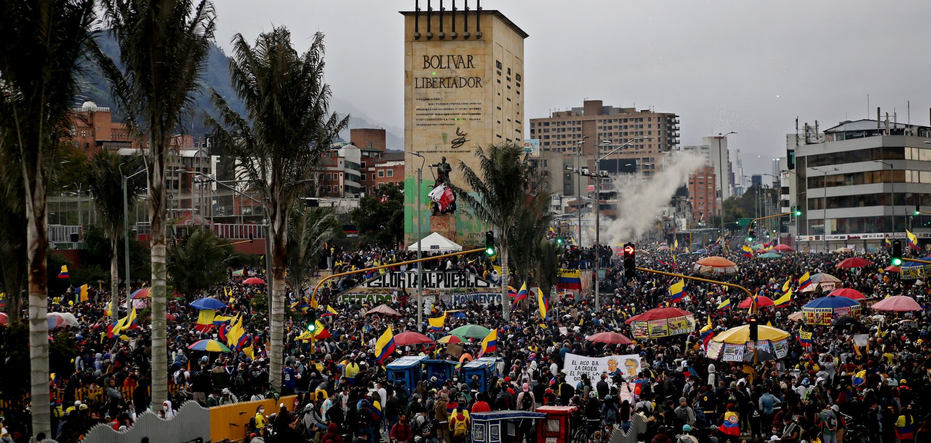 People gather in the streets of Bogota, Colombia, to participate in anti-government protests on May 15, 2021. 