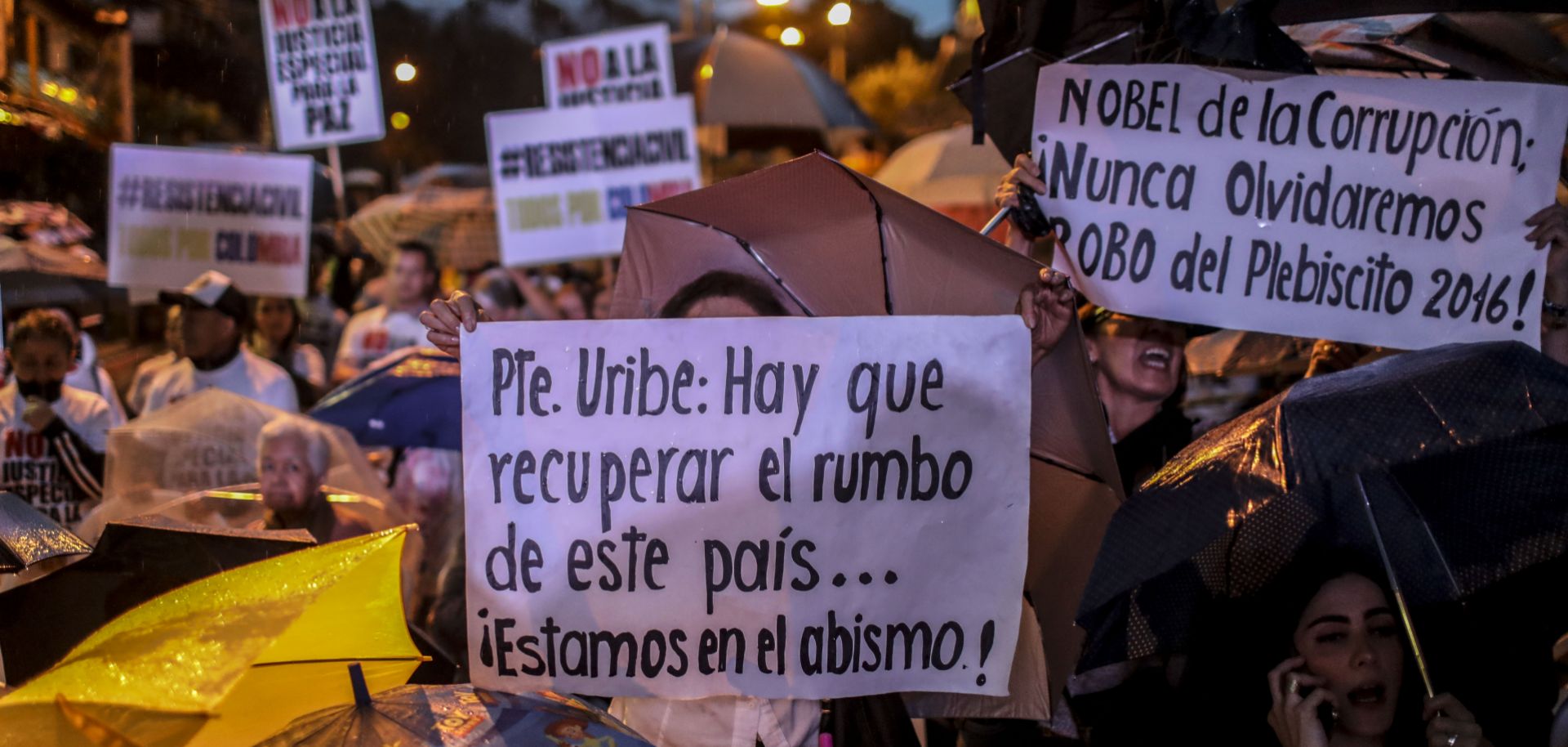 Supporters of current senator and former Colombian President Alvaro Uribe attend a rally with presidential candidates from Uribe's coalition in Medellin on Oct. 2, 2017.