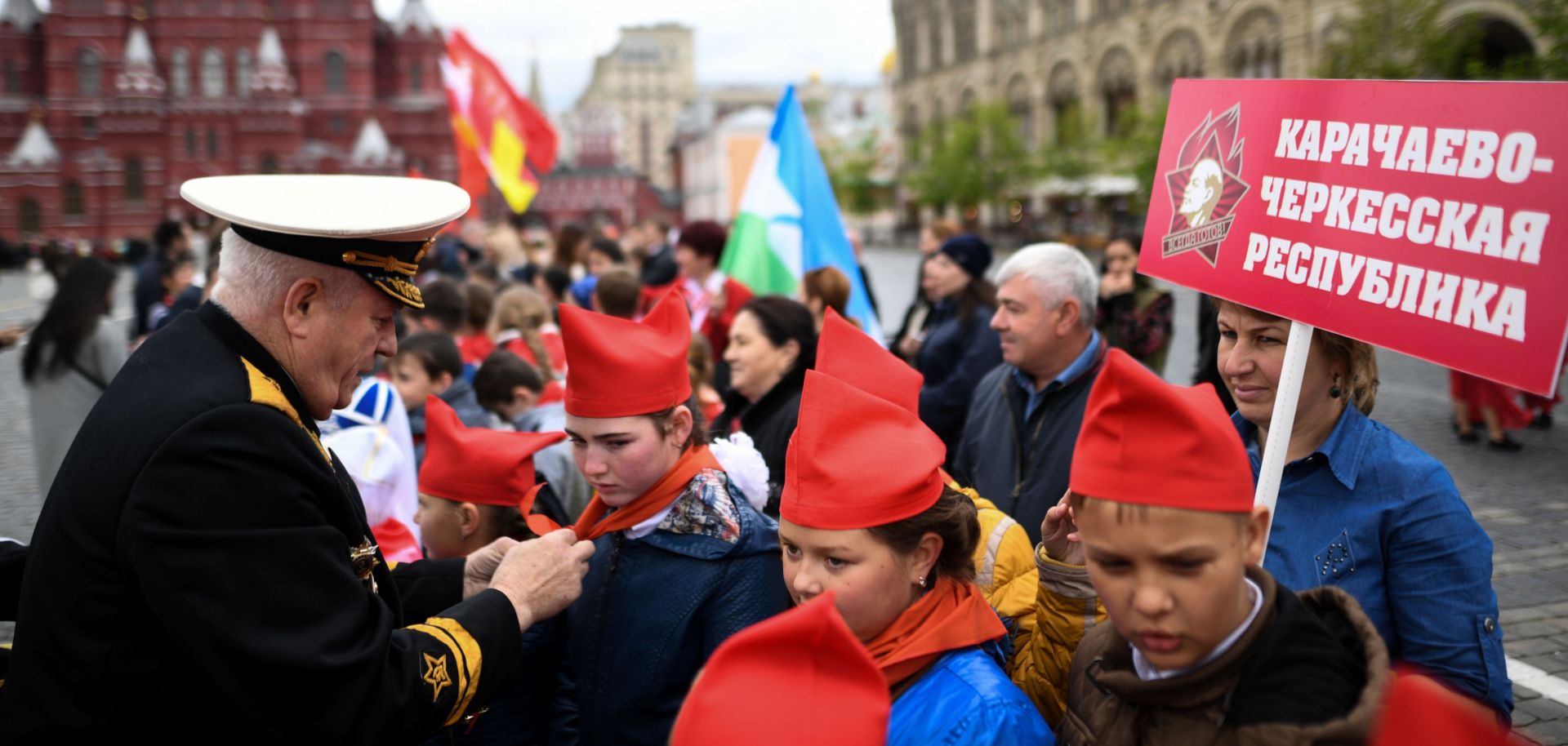 Russian children are initiated into the Communist Party's Young Pioneer group. The Party's efforts to rebrand itself include attracting more young Russians to join its youth organizations.