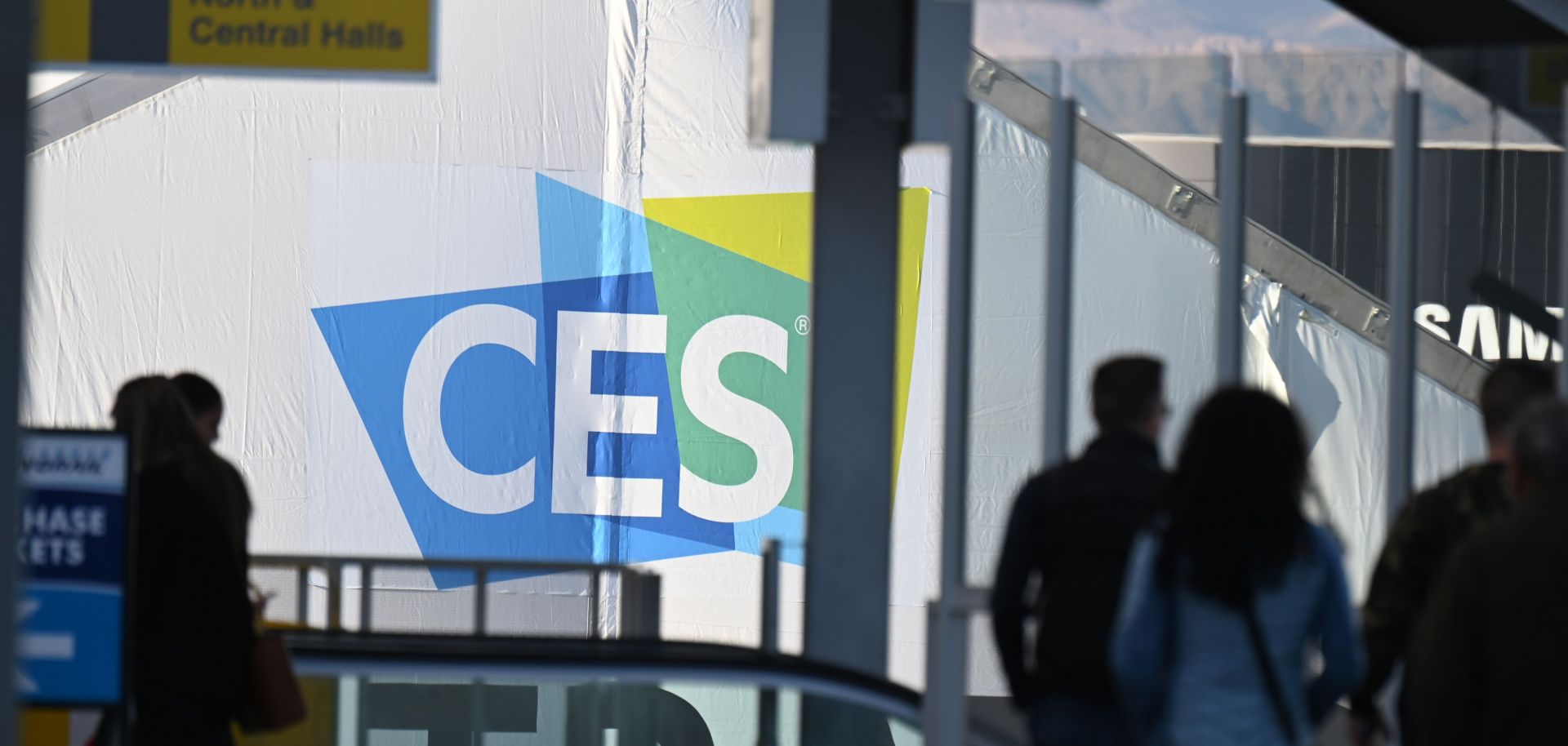 Attendees arrive on Jan. 6 at the Las Vegas Convention Center, where preparation is underway for the CES 2019 technology show.