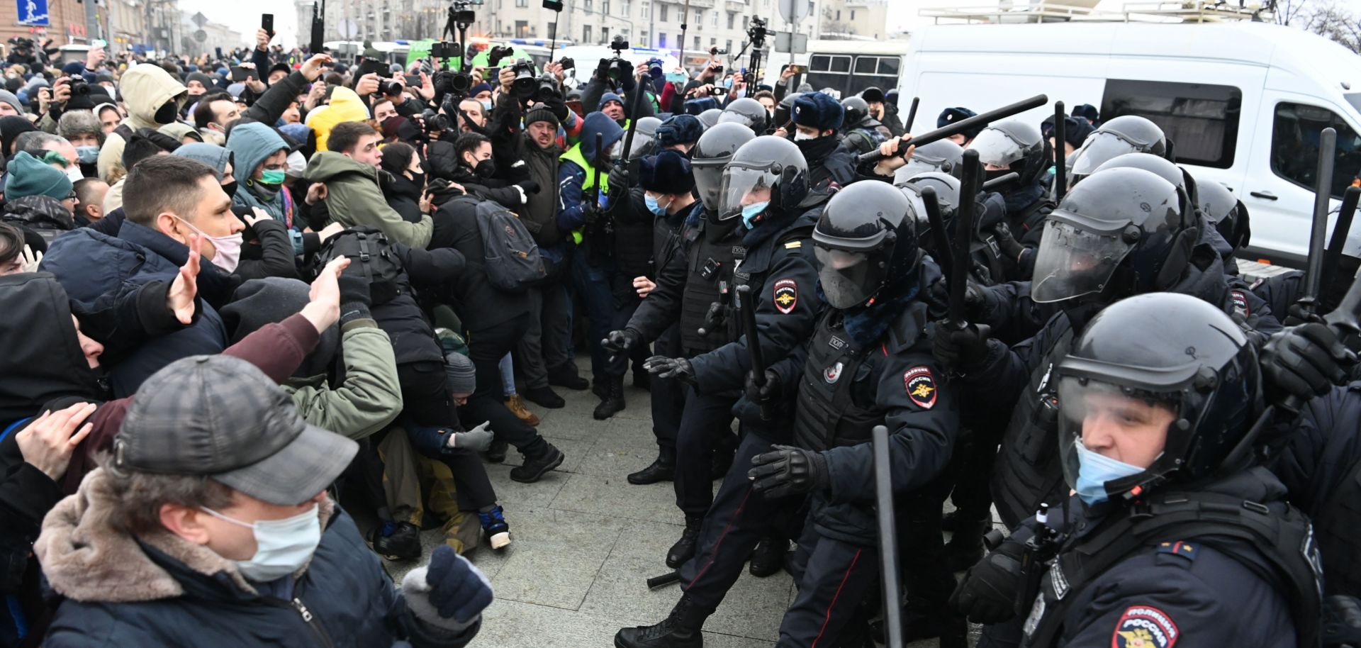 Protesters clash with riot police during a rally in support of jailed opposition leader Alexei Navalny in Moscow, Russia, on Jan. 23, 2021. Navalny was detained upon returning to Moscow after spending five months in Germany recovering from a near-fatal poisoning.  