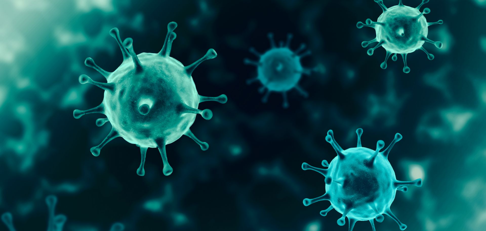 A 3D rendering of the novel coronavirus floating in a cellular environment.