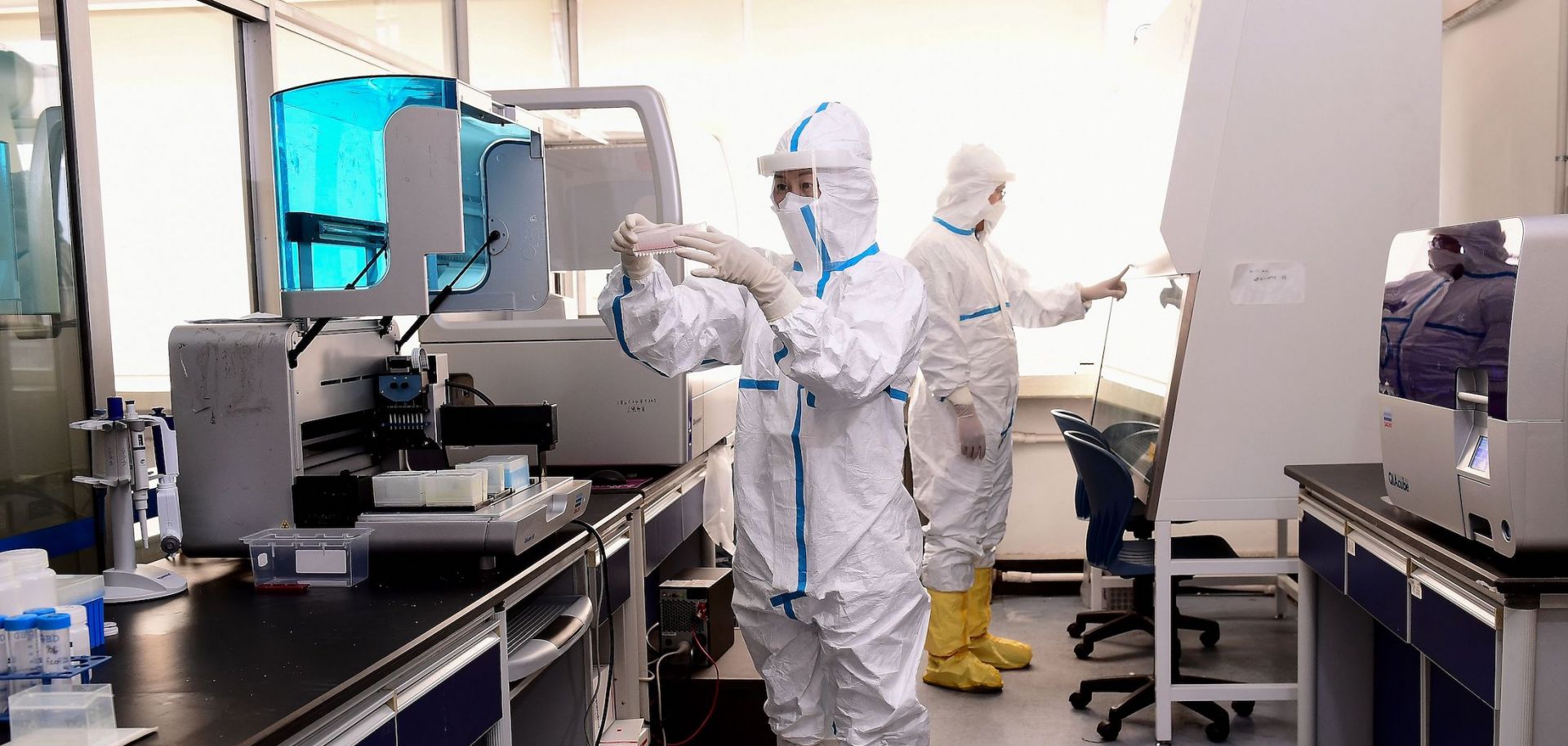 Chinese lab technicians in Shenyang test samples from patients suspected of being ill with the new coronavirus on Feb. 12, 2020.