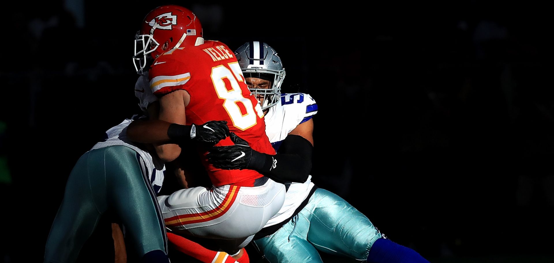 Dallas Cowboys player Damien Wilson tackles a member of the Kansas City Chiefs in a game in Arlington, Texas, on Nov. 5, 2017. 