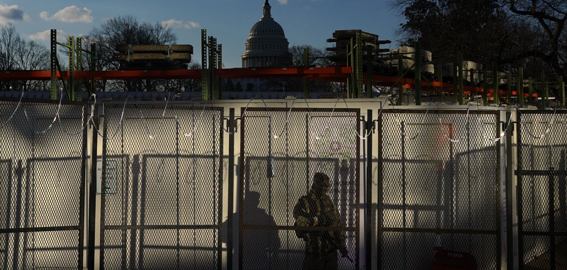 A National Guardsman monitors a security checkpoint near the U.S. Capitol on Jan. 20, 2021, in Washington.