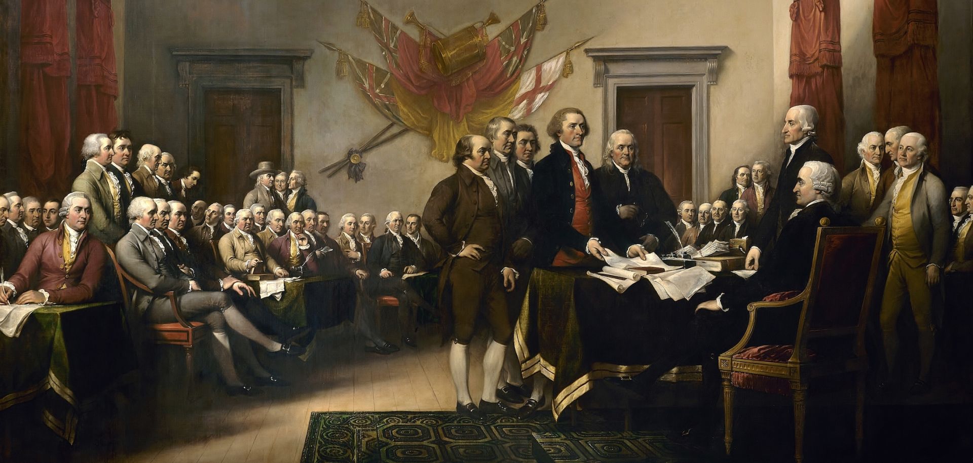 The presentation of the American Declaration of Independence, as depicted in a painting by John Trumbull.