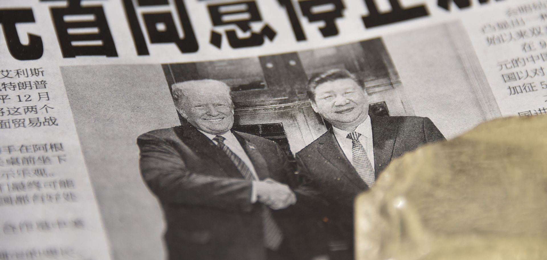A Chinese newspaper on display at a newsstand in Beijing on Dec. 3, 2018, features a front-page story about the Group of 20 meeting between Chinese President Xi Jinping and U.S President Donald Trump in which the two leaders agreed to a trade truce.