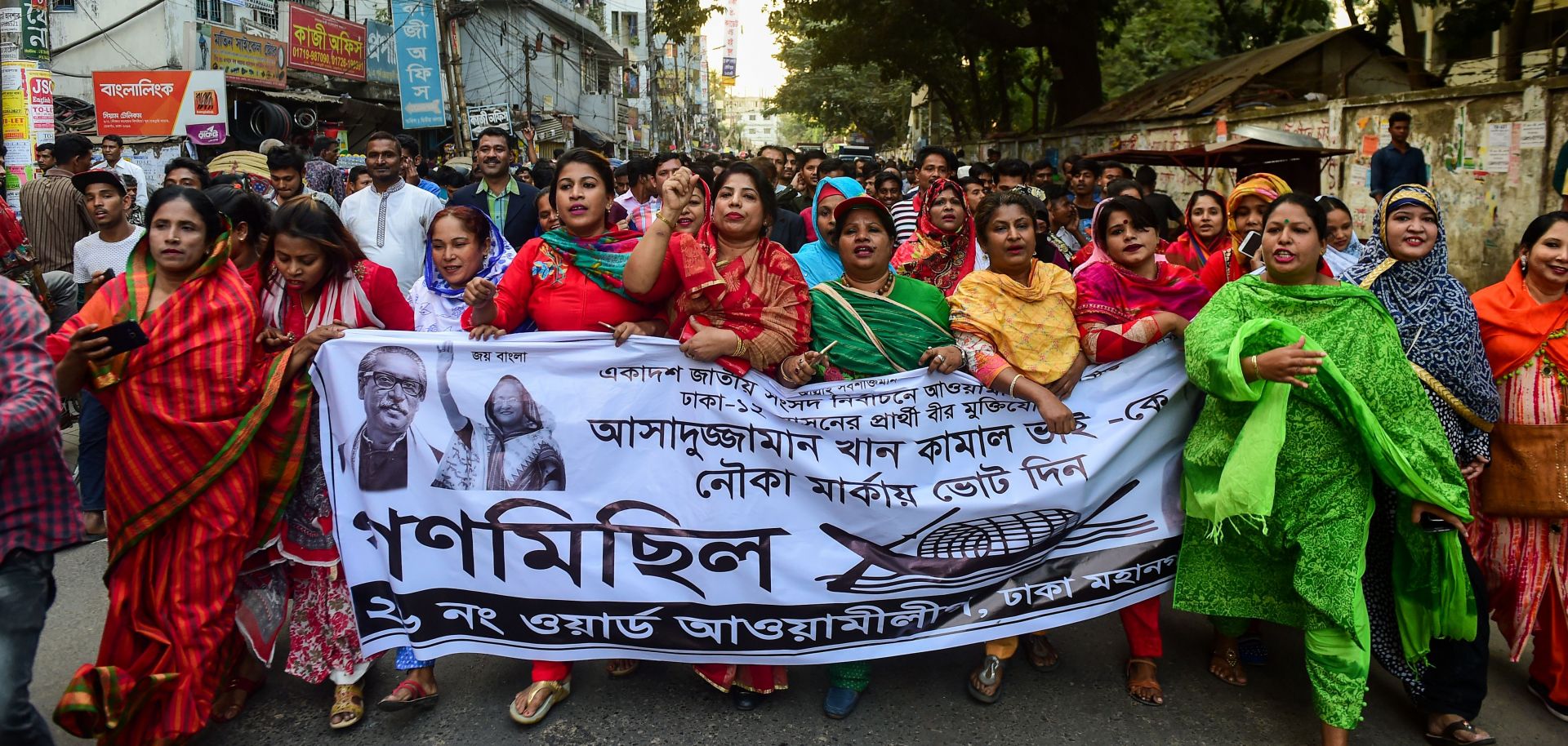 Supporters of Bangladesh's Awami League march during a general election campaign procession in the capital of Dhaka on Dec. 10, 2018.