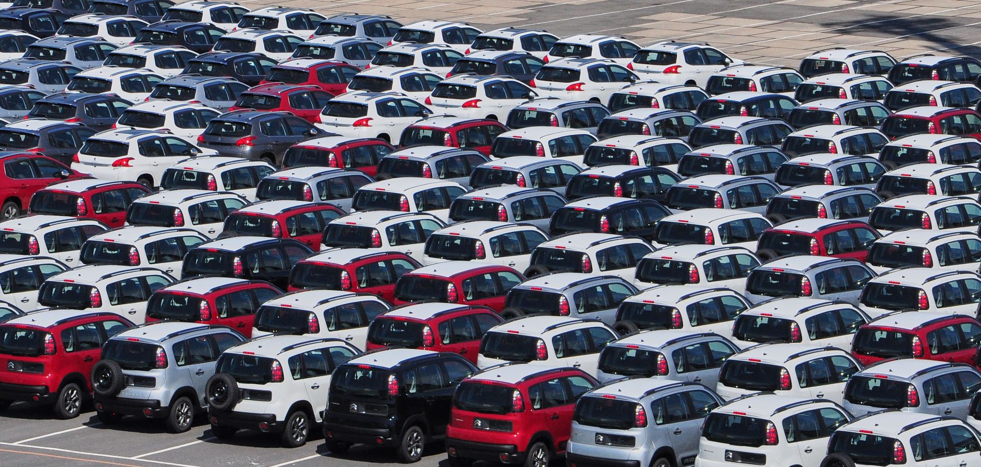 New Peugeot and Citroen cars await shipment on the pier in Rio de Janeiro, Brazil, in February 2017.